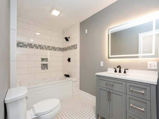 613 E 8th St N, Newton, IA 50208 - full bathroom featuring toilet, vanity,  shower combination, and baseboards