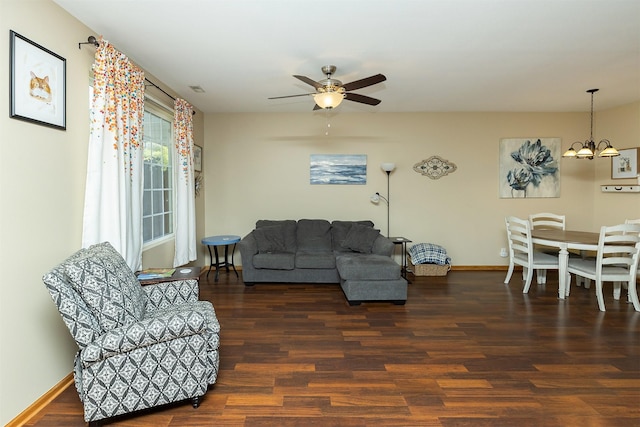 2819 Ashland Ct, Altoona, IA 50009 - living area with wood finished floors, a ceiling fan, a chandelier, and baseboards