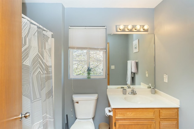 2819 Ashland Ct, Altoona, IA 50009 - full bath with vanity, toilet, and a shower with curtain