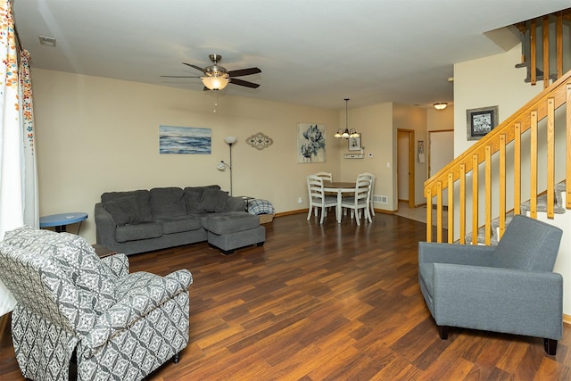 2819 Ashland Ct, Altoona, IA 50009 - living room featuring wood finished floors, ceiling fan, stairway, and baseboards