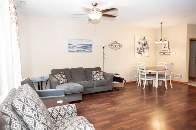 2819 Ashland Ct, Altoona, IA 50009 - living room with a chandelier, wood finished floors, and ceiling fan