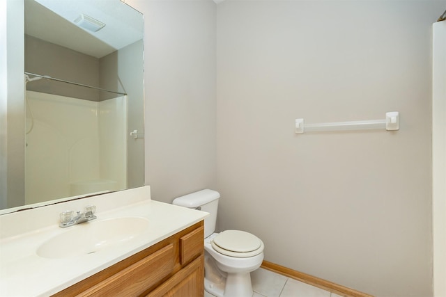 1325 SE Florence Dr Unit 207, Waukee, IA 50263 - bathroom with vanity, toilet, tile patterned floors, and a shower