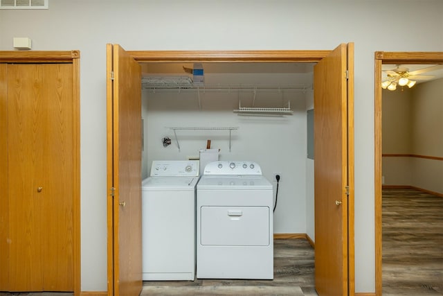 1325 SE Florence Dr Unit 207, Waukee, IA 50263 - laundry area with separate washer and dryer, wood finished floors, a ceiling fan, and baseboards