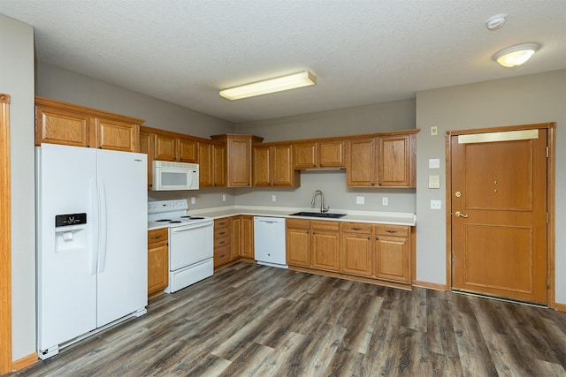 1325 SE Florence Dr Unit 207, Waukee, IA 50263 - kitchen with white appliances, a sink, dark wood-style flooring, light countertops, and a textured ceiling