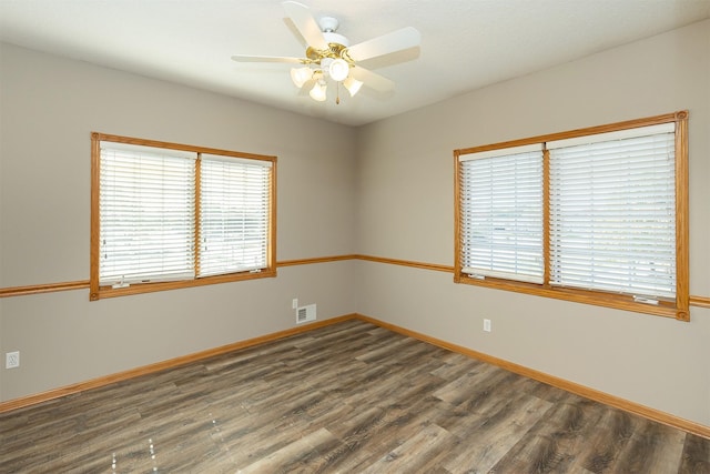 1325 SE Florence Dr Unit 207, Waukee, IA 50263 - unfurnished room featuring wood finished floors, baseboards, and a ceiling fan