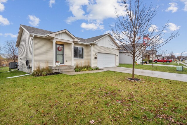 ranch-style home with central AC unit, a front lawn, an attached garage, and concrete driveway