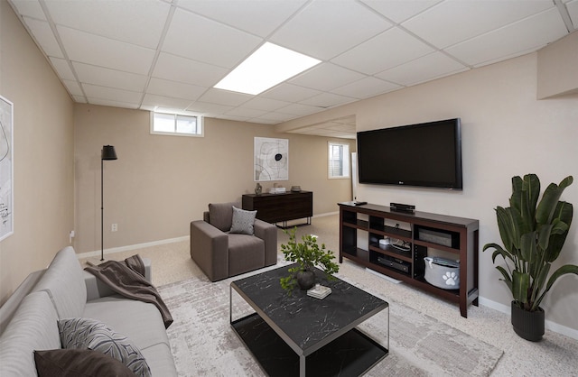 15026 Hawthorn Dr, Clive, IA 50325 - carpeted living room with a paneled ceiling, baseboards, and plenty of natural light