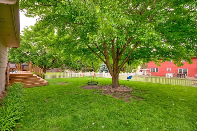 15026 Hawthorn Dr, Clive, IA 50325 - view of yard featuring a playground and a wooden deck