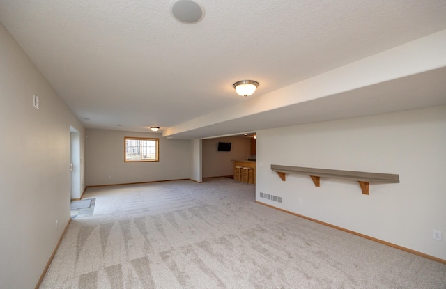 4328 125th St, Urbandale, IA 50323 - spare room with light carpet and baseboards