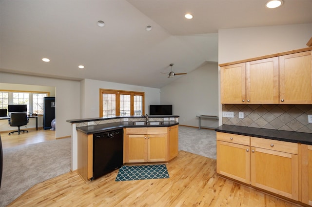 4328 125th St, Urbandale, IA 50323 - kitchen with open floor plan, black dishwasher, light wood-style flooring, dark countertops, and recessed lighting