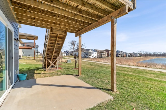 7821 NW 96th St, Johnston, IA 50131 - view of patio / terrace with a residential view and a water view