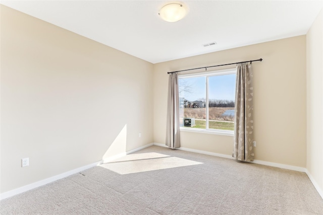 7821 NW 96th St, Johnston, IA 50131 - empty room with carpet flooring and baseboards
