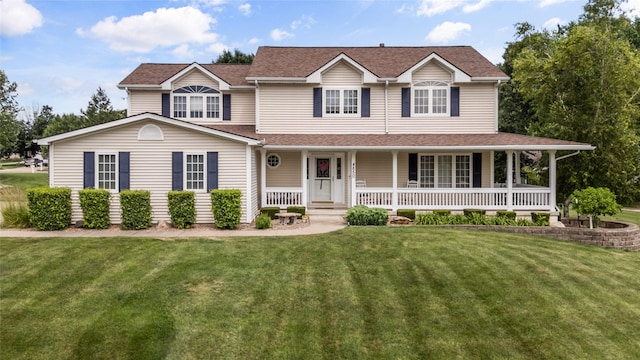 4850 Augusta Ln, Pleasant Hill, IA 50327 - view of front facade featuring a porch and a front lawn