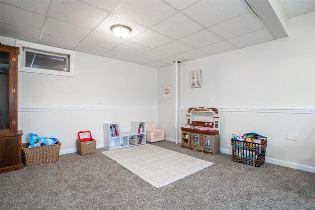 200 Space Ave SW, Mitchellville, IA 50169 - playroom with carpet flooring, a drop ceiling, and baseboards