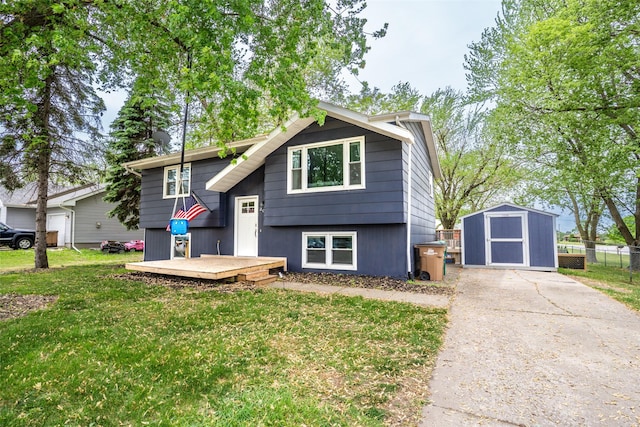 200 Space Ave SW, Mitchellville, IA 50169 - split foyer home featuring a storage unit, an outdoor structure, and a deck
