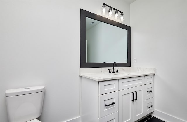 25019 Eagle Vista Dr, Adel, IA 50003 - bathroom featuring vanity and toilet