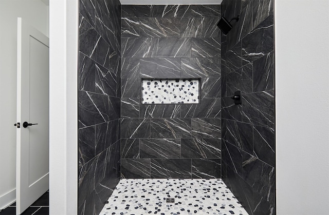 25019 Eagle Vista Dr, Adel, IA 50003 - bathroom featuring tiled shower