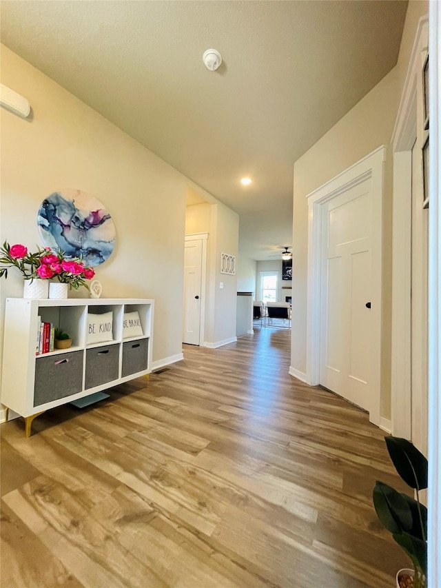 425 SE Hollow Ct, West Des Moines, IA 50265 - interior space with baseboards, recessed lighting, and wood finished floors
