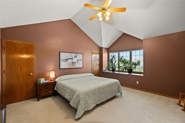 317 59th St, West Des Moines, IA 50266 - carpeted bedroom featuring ceiling fan, baseboards, and high vaulted ceiling