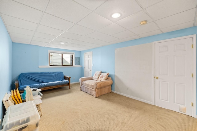 317 59th St, West Des Moines, IA 50266 - living area featuring carpet, baseboards, and a drop ceiling