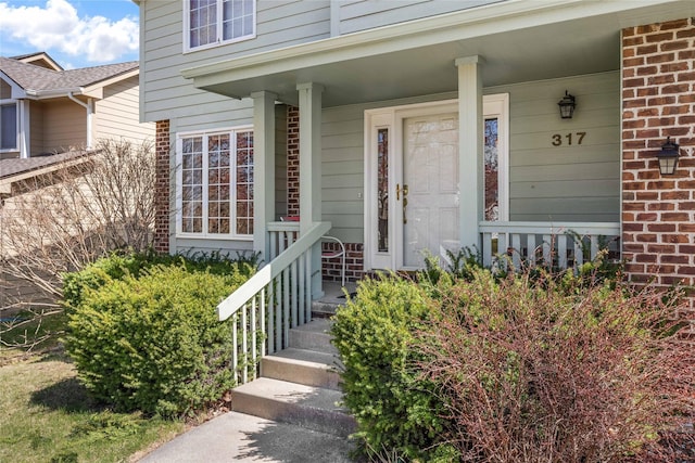 317 59th St, West Des Moines, IA 50266 - entrance to property featuring brick siding