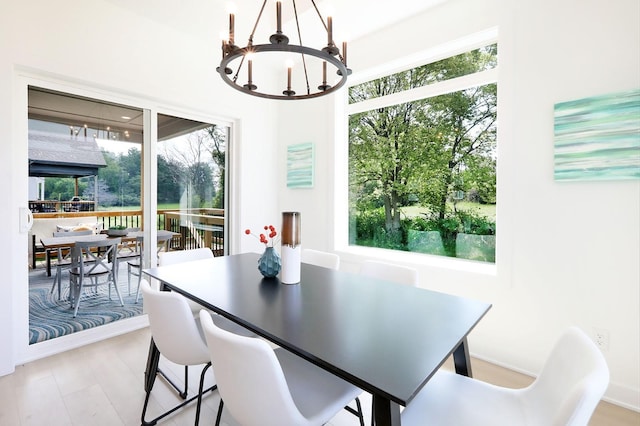 dining space with a notable chandelier
