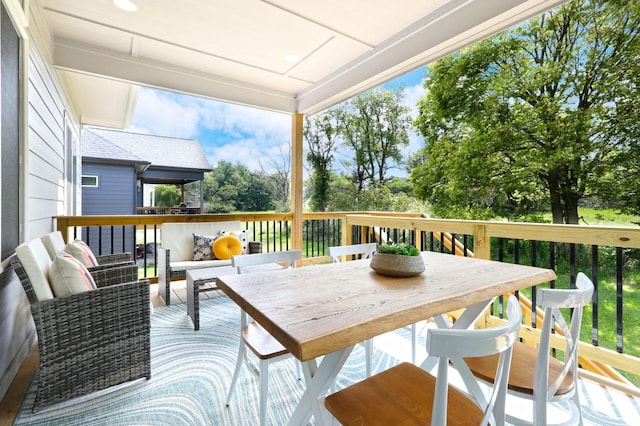 deck with an outdoor hangout area