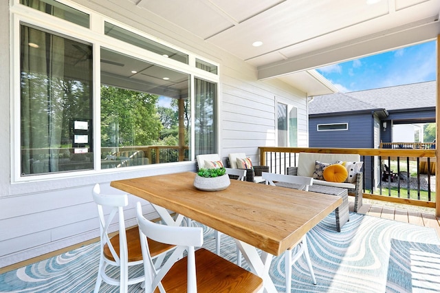 deck featuring outdoor dining space
