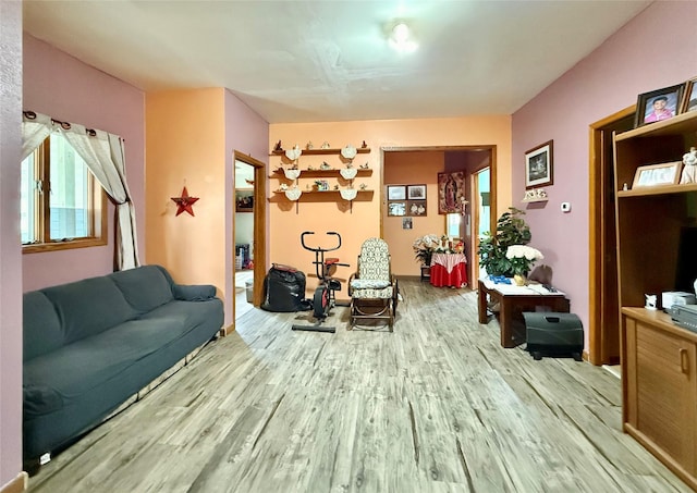 603 E Church St, Marshalltown, IA 50158 - living room featuring wood finished floors