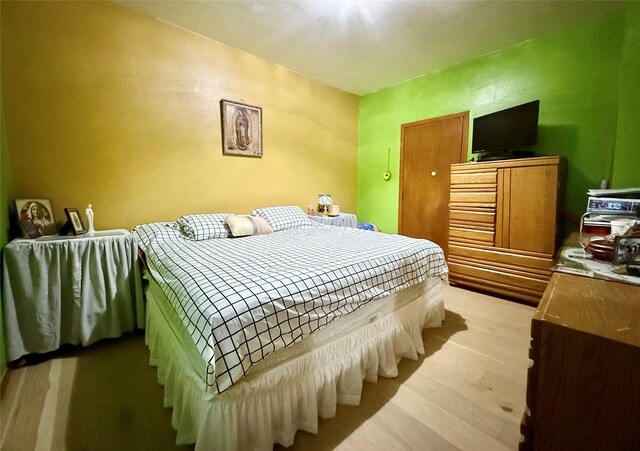 603 E Church St, Marshalltown, IA 50158 - bedroom featuring light wood-style flooring