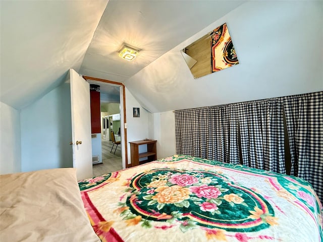 603 E Church St, Marshalltown, IA 50158 - bedroom featuring vaulted ceiling