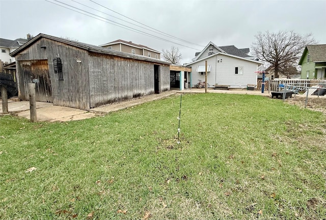 603 E Church St, Marshalltown, IA 50158 - view of yard with fence and a patio