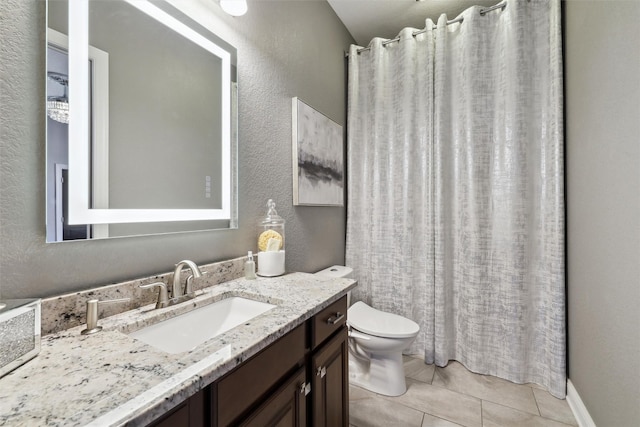 3144 Prairie Rose Dr, Norwalk, IA 50211 - bathroom featuring vanity, a textured wall, tile patterned floors, and toilet