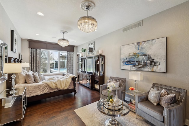 3144 Prairie Rose Dr, Norwalk, IA 50211 - bedroom with a notable chandelier, recessed lighting, hardwood / wood-style floors, and visible vents