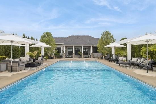 3144 Prairie Rose Dr, Norwalk, IA 50211 - community pool featuring an outdoor living space and a patio area