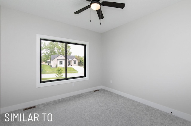 18048 Tanglewood Dr, Clive, IA 50325 - carpeted spare room featuring baseboards and ceiling fan
