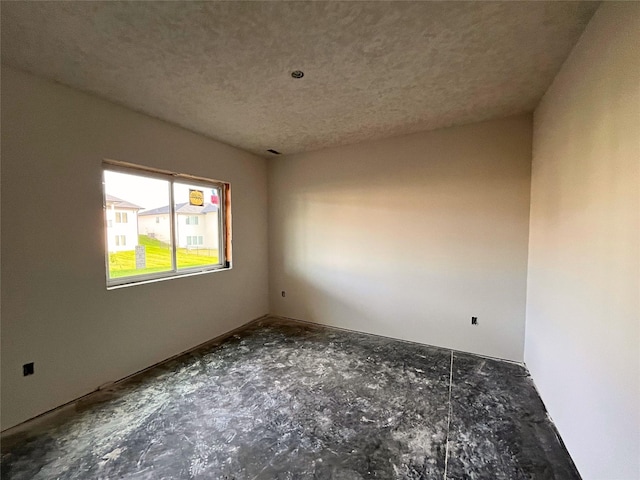 18048 Tanglewood Dr, Clive, IA 50325 - empty room with a textured ceiling