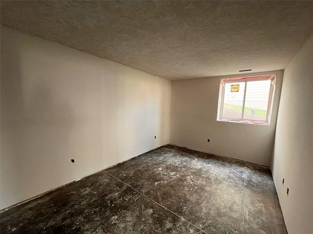 18048 Tanglewood Dr, Clive, IA 50325 - empty room featuring a textured ceiling
