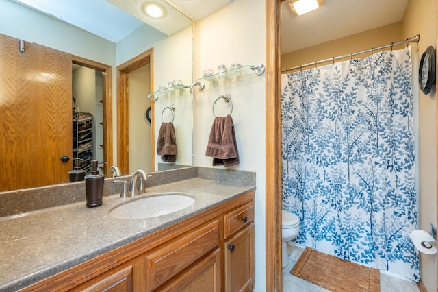 4774 Coachlight Dr, West Des Moines, IA 50265 - full bath with toilet, vanity, and curtained shower