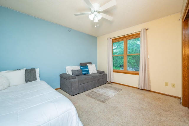 4774 Coachlight Dr, West Des Moines, IA 50265 - carpeted bedroom with baseboards and a ceiling fan