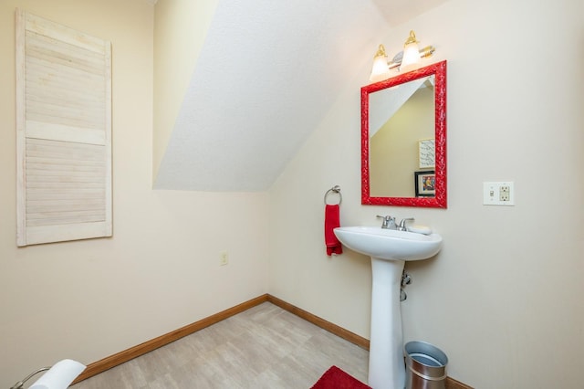 4774 Coachlight Dr, West Des Moines, IA 50265 - bathroom featuring baseboards, tile patterned floors, and a sink