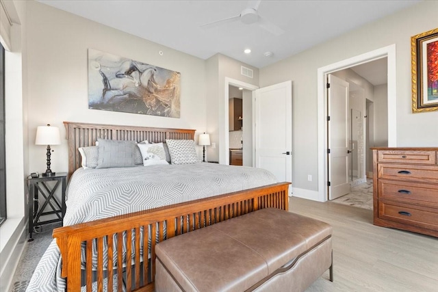 1645 SW Magazine Rd Unit 102, Ankeny, IA 50023 - bedroom with light wood finished floors, recessed lighting, and ceiling fan