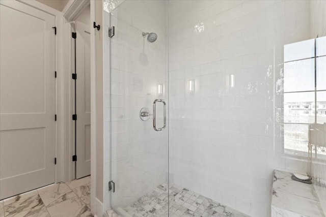 1645 SW Magazine Rd Unit 102, Ankeny, IA 50023 - bathroom with a stall shower and marble look tile flooring
