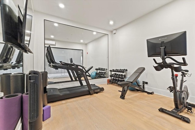 1645 SW Magazine Rd Unit 102, Ankeny, IA 50023 - workout room with wood finished floors and recessed lighting