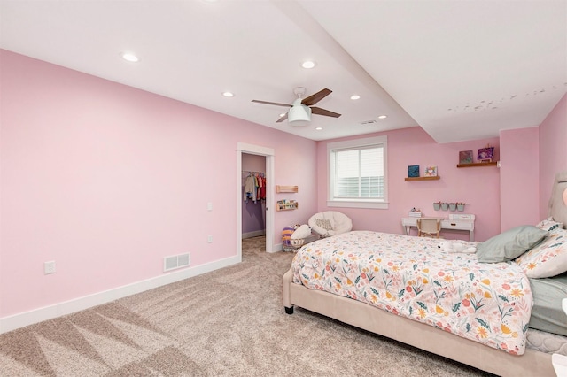 16206 Brookview Dr, Urbandale, IA 50323 - bedroom with recessed lighting, carpet flooring, baseboards, a spacious closet, and ceiling fan