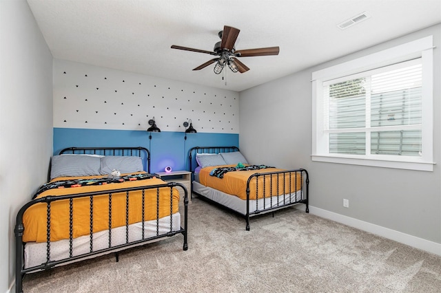 16206 Brookview Dr, Urbandale, IA 50323 - bedroom with carpet, baseboards, and ceiling fan