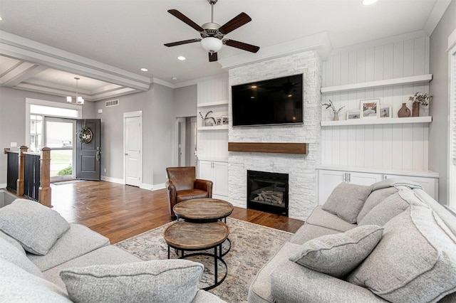 16206 Brookview Dr, Urbandale, IA 50323 - living area featuring wood finished floors, ceiling fan, baseboards, a fireplace, and recessed lighting