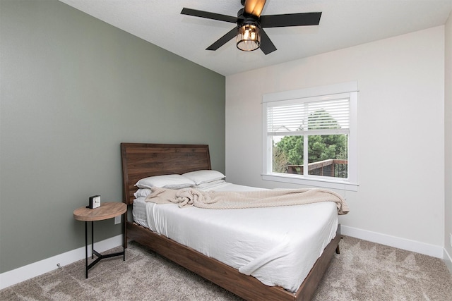 16206 Brookview Dr, Urbandale, IA 50323 - bedroom with carpet flooring, baseboards, and a ceiling fan
