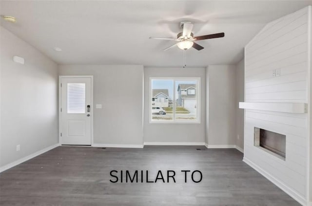 unfurnished living room with wood finished floors, baseboards, and ceiling fan