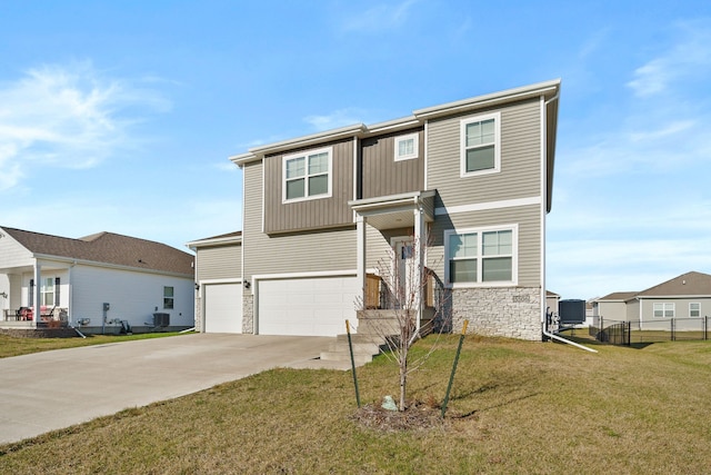 5506 145th St, Urbandale, IA 50323 - view of front facade with stone siding, a garage, concrete driveway, and central air condition unit